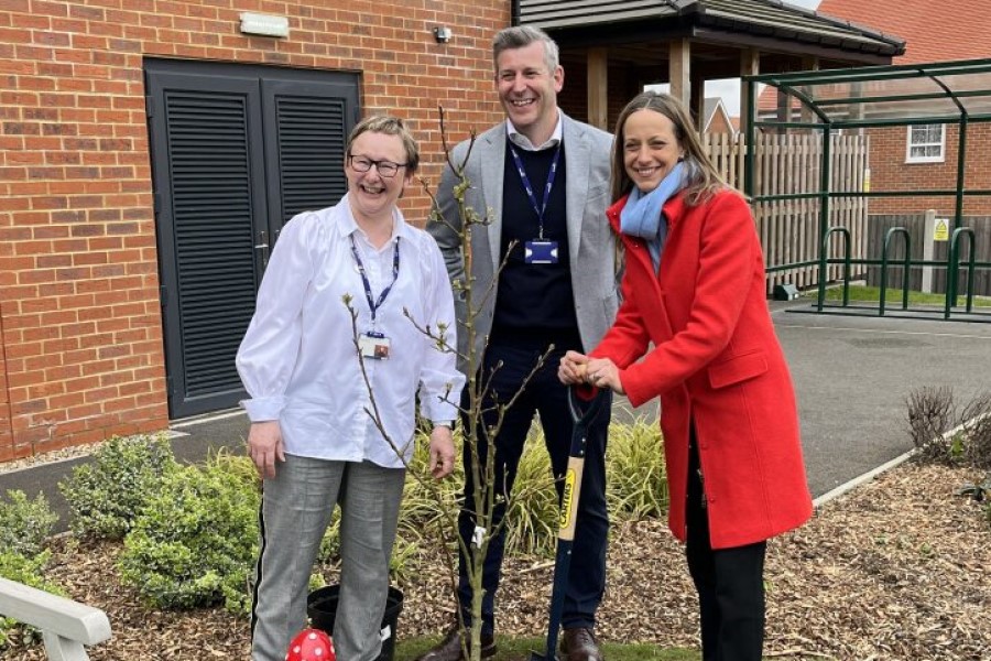 Social care minister plants tree at Faversham home 